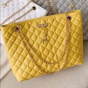 Beautiful quilted lightweight vegan leather bag.